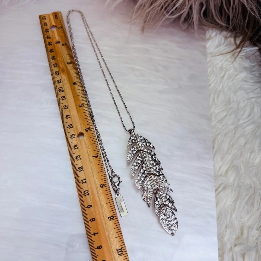 Silvertone Hinged Bling Leaf Pendant Long Necklace
